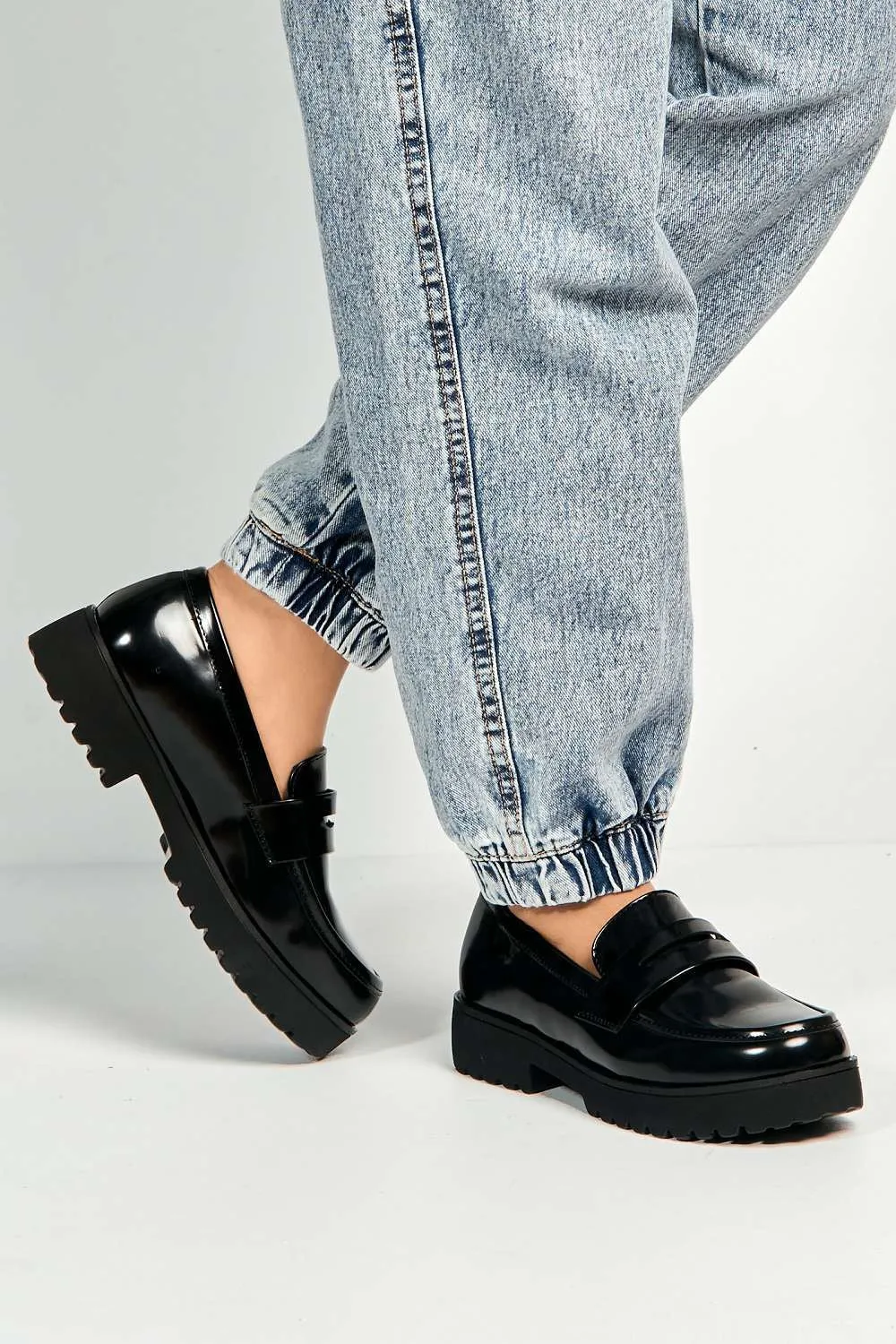 Caddie Round Toe Slip-On Loafers in Black Matt