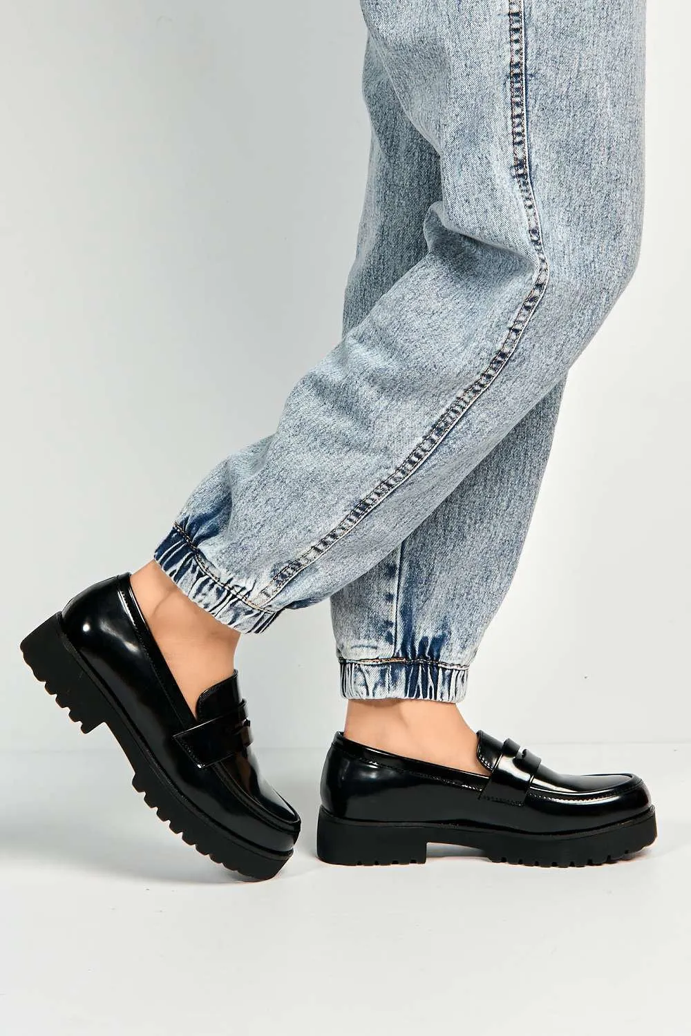 Caddie Round Toe Slip-On Loafers in Black Matt